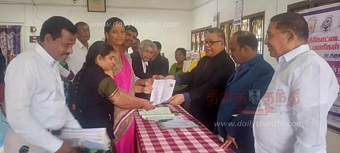 11 வழக்குகளுக்கு தீர்வு;2 கோடி வசூல்