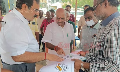 அடுக்குமாடி குடியிருப்பு கட்டும் பணி