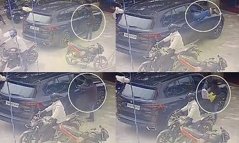 சொகுசு கார் கண்ணாடியை உடைத்து ரூ.13 லட்சம் கொள்ளை - பட்டப்பகலில் துணிகரம்