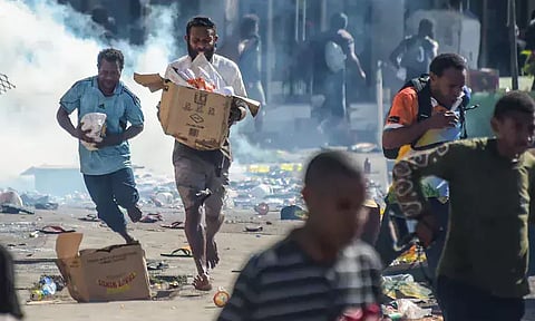 பப்புவா நியூ கினியா: இரு நகரங்களில் ஏற்பட்ட கலவரத்தில் 15 பேர் பலி