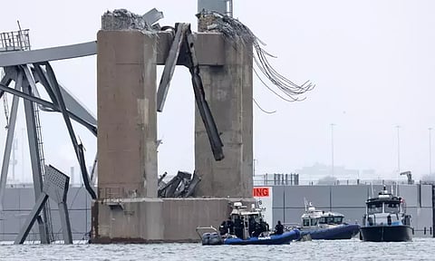 அமெரிக்க பாலம் விபத்து: 2 உடல்கள் மீட்பு