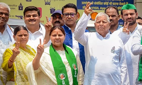 RJD chief Lalu Prasad Yadav with Rabri Devi and party candidate from Patliputra constituency Misa Bharti