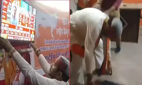 பெரும்பான்மை கிடைக்கவில்லை.. டி.வி.யை தூக்கி போட்டு உடைத்து பாஜக தொண்டர் ஆவேசம்