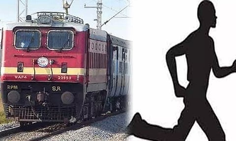 தூங்கியதால் இறங்க மறந்தார்: அபாய சங்கிலியை இழுத்து ரெயிலை நிறுத்திவிட்டு வாலிபர் ஓட்டம்