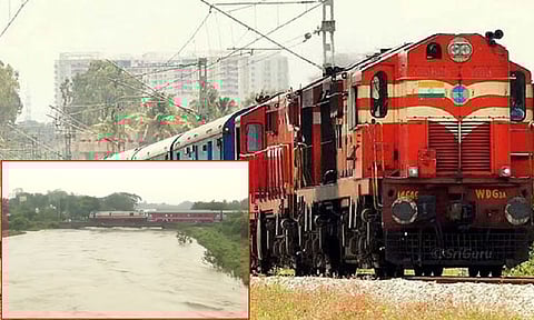 பாலத்தை சூழ்ந்த வெள்ளம்.. விழுப்புரம் வழித்தடத்தில் ரெயில் போக்குவரத்து பாதிப்பு