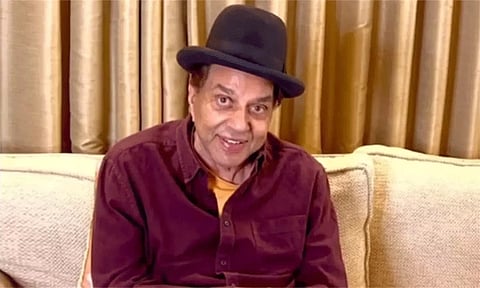 மோசடி வழக்கு; நேரில் ஆஜராக பாலிவுட் நடிகர் தர்மேந்திராவுக்கு டெல்லி கோர்ட்டு சம்மன்