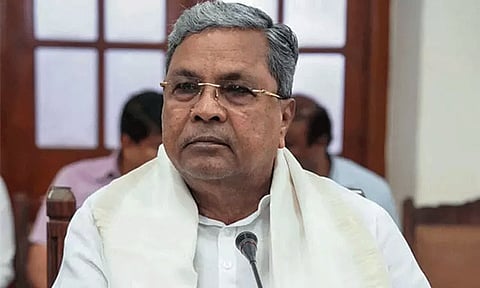 கர்நாடக முதல்-மந்திரி சித்தராமையா உள்ளிட்டோரின் ரூ.300 கோடி சொத்துகள் முடக்கம்