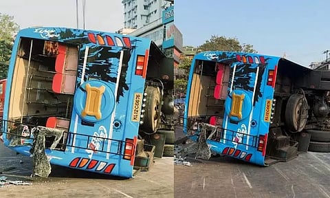 சாலை தடுப்பு சுவரில் மோதி தலைகீழாக கவிழ்ந்த பஸ் - 50 பேர் காயம்