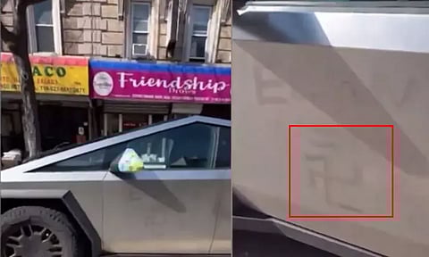 டெஸ்லா வாகனம் மீது சுவஸ்திகா முத்திரை வரைந்த நபர்; முட்டாள் மக்கள் என சாடிய மஸ்க்