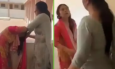 பள்ளியில் முதல்வர், ஊழியர் குடுமிப்பிடி சண்டை; வைரலான வீடியோ