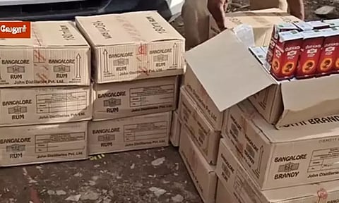 வேலூர்: கர்நாடகாவில் இருந்து கடத்தி வரப்பட்ட 1,800 மது பாக்கெட்டுகள் பறிமுதல் - ஒருவர் கைது