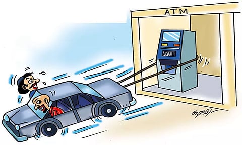 மும்பை: ஏ.டி.எம். எந்திரத்தை காரில் கயிறு கட்டி இழுத்த கொள்ளை கும்பலுக்கு போலீஸ் வலை