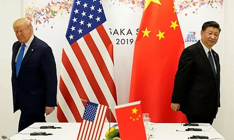 அமெரிக்கா 100 சதவீத வரி விதிப்பு; மிரட்டலுக்கு பயப்பட மாட்டோம் - சீனா