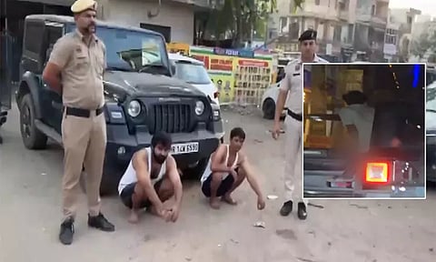 அரியானாவில் ஓடும் காரில் கதவை திறந்து சிறுநீர் கழித்த விவகாரம் - இருவர் கைது