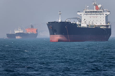 Oil tankers sit at anchor offshore in the Strait of Hormuz off Bandar Abbas, Iran, Saturday, May 2, 2026. AP photo