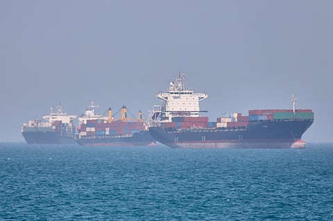 Container ships sit at anchor in the Strait of Hormuz off Bandar Abbas, Iran, Saturday, May 2, 2026. AP photo