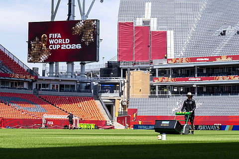 A worker mows the grass at Toronto Stadium, Thursday June 4, 2026, in Toronto, in preparation for World Cup soccer tournament