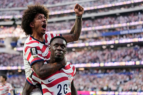 United States' Folarin Balogun (20) celebrates scoring his side's third goal against Paraguay, Friday, June 12, 2026. AP Photo