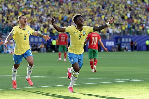 Brazil's Vinicius Junior (7) celebrates a goal in the first half during the World Cup match against Morocco in East Rutherford, N.J., near New York, Saturday,