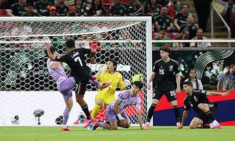 Mexico into last 32, Canada celebrate historic win