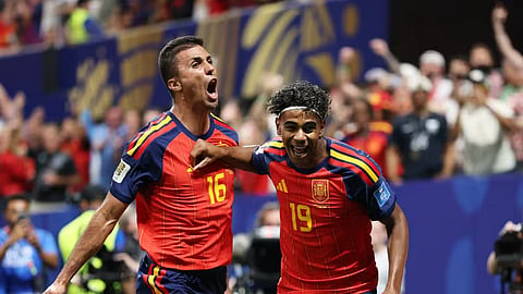 Spain's Lamine Yamal celebrates after scoring his first World Cup goal.