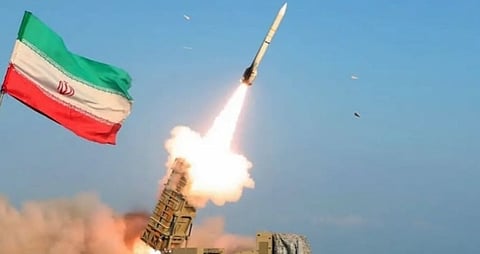 A missile strikes a high-rise building in Iran.