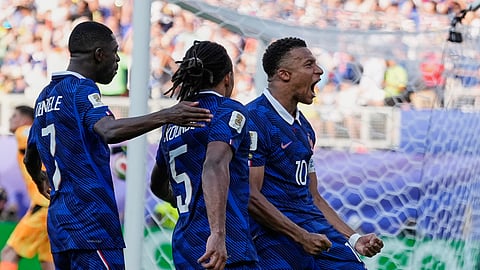 France's Kylian Mbappe celebrates after scoring from the penalty spot the opening goal during the World Cup Round of 16 match between Paraguay and France in Philadelphia on Sunday