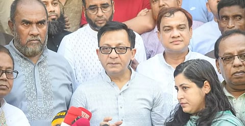Commerce Minister Khandaker Abdul Muktadir speaks to reporters at the Sylhet Sadar Upazila Auditorium.