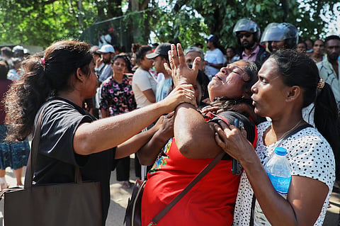 A relative of an inmate breaks down outside a prison where deadly clashes broke out on Sunday, in Negombo, 35 kilometers (22 miles) north of the capital Colombo, Sri Lanka, 6 July 2026.