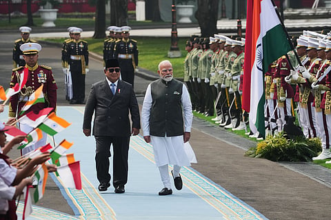 India's Prime Minister Narendra Modi, right, and Indonesia's President Prabowo Subianto inspect honor guards during the welcoming ceremony ahead of their meeting at Merdeka Palace in Jakarta, Indonesia, 7 July 2026.