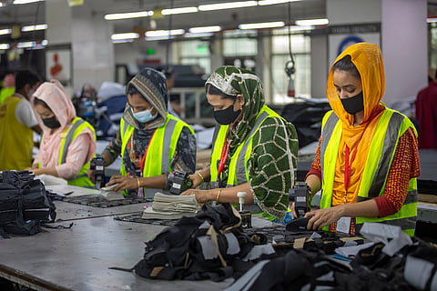 Women working in a garment factory.
