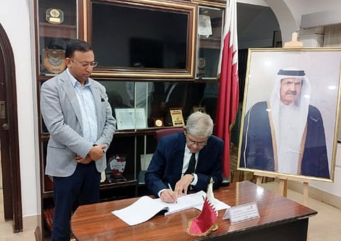 Local Government, Rural Development and Cooperatives Minister Mirza Fakhrul Islam Alamgir signs the condolence book at the Qatari Embassy