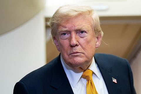 President Donald Trump speaks with reporters in flight on Air Force One after landing at US Air Force Base at RAF Mildenhall, in Suffolk Eastern England, 8 July 2026.