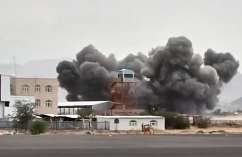 This image taken from video broadcast by Al-Masirah TV, a Houthi-controlled news channel, shows an explosion at the Sanaa International Airport compound during what the Iranian-backed Houthi rebels in Yemen said were several Saudi airstrikes in Sanaa, Yemen, Monday, July 13, 2026.