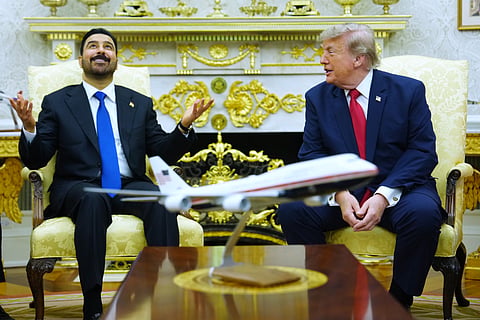 President Donald Trump greets Iraq's Prime Minister Ali al-Zaidi at the White House, 14 July 2026, in Washington.
