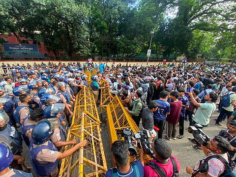 Protesting students on their “Long March to the Ministry of Education” from the Science Laboratory intersection in the capital have reached the front of the Shikkha Bhaban, where they came across police barricades and stopped.
