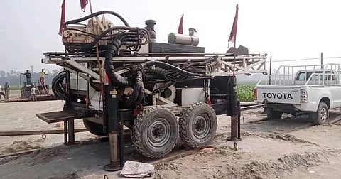 A drilling rig outside the sight at Velamari Pathar in Chhota Paharpur village under Sanerhat Union.