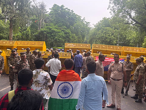 Supporters of the Cockroach Janta Party arrive as they gather to march to India's Parliament, demanding the resignation of the education minister, in New Delhi, 20 July 2026.