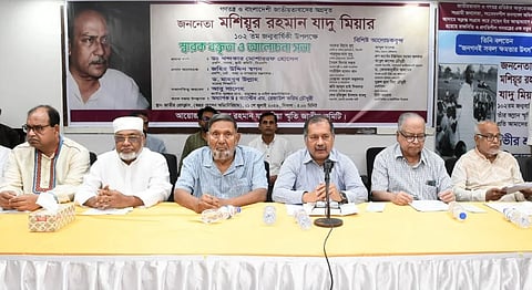 Information and Broadcasting Minister Zahir Uddin Swapon speaks at a discussion marking the 102nd birth anniversary of Moshiur Rahman Jadu Miah at Jatiya Press Club on July 21, 2026.