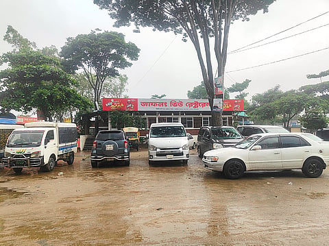 Cars parked at Jaflong tourist destination.