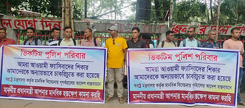 A human chain programme held in front of the Jatiya Press Club in the capital.