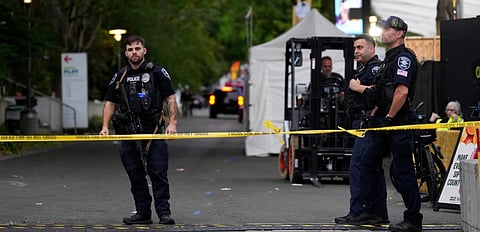 Police respond to a shooting at Seattle Center during the Bite of Seattle food festival Sunday, July 26, 2026, in Seattle, Wash.