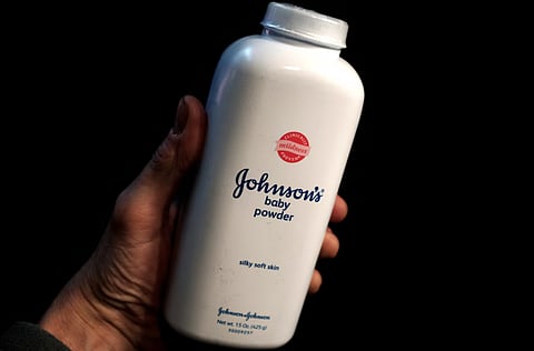 A bottle of Johnson and Johnson Baby Powder is seen in a photo illustration taken in New York, February 24, 2016.