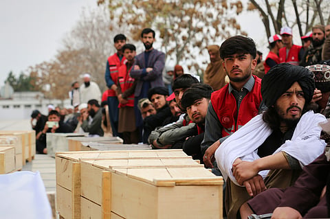 Mourners attend a second mass funeral for victims of an airstrike on a drug rehabilitation center earlier this month, in Kabul, Afghanistan, Thursday, March 26, 2026.