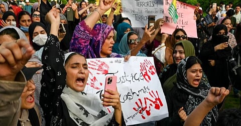 Activists stage a protest in Islamabad, Pakistan, on July 29 following unrest that erupted during the first phase of elections for the legislative assembly in Pakistan-administered Kashmir.