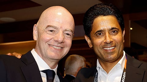 FIFA president Gianni Infantino (L), Nasser Al-Khelaifi