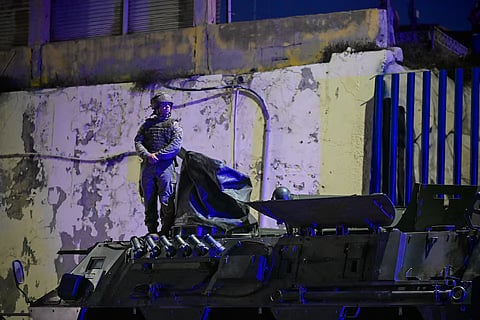 Spanish military stands at the border between the Spanish enclave of Ceuta and Morocco, after thousands of migrants crossed into Ceuta by sea, as seen from Ceuta, Spain, July 30, 2026.