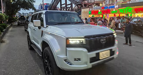Prime Minister Tarique Rahman's vehicle passes through a road in Dhaka during his inspection of the capital's cleanliness on Friday.