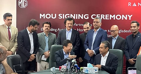 Representatives of Pakistan's MG JW Automobile and Bangladesh's RANCON Group at a signing ceremony on Friday.