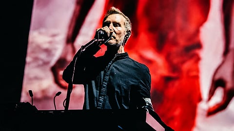 Two members of British band Massive Attack were issued with stern warnings and barred from re-entering Singapore